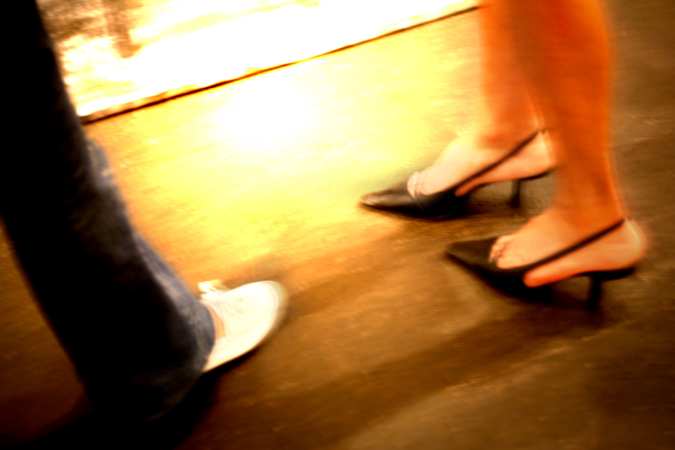 white sneaker and high heel